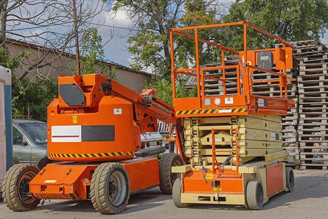 worker using forklift to transport goods in warehouse in Abbeville LA